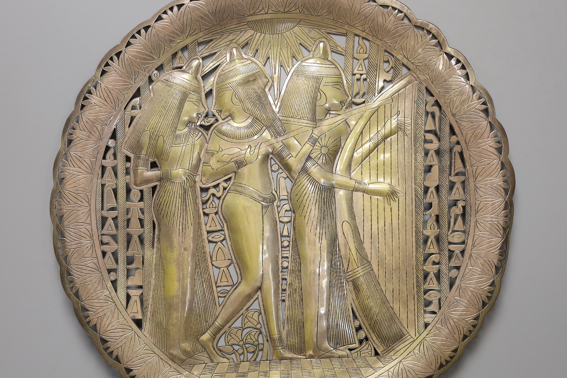 A set of four Christofle plated serving dishes, a similar ecuelle and cover and an Egyptian plated dish.